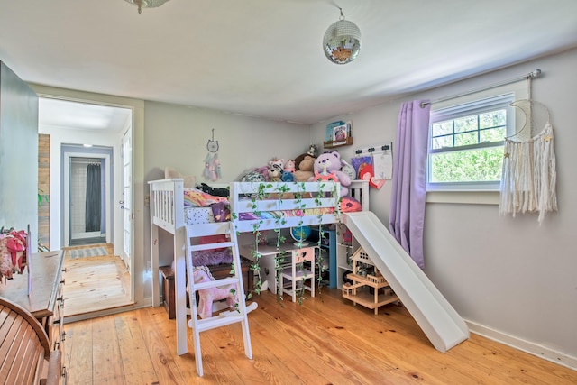 bedroom featuring wood-type flooring