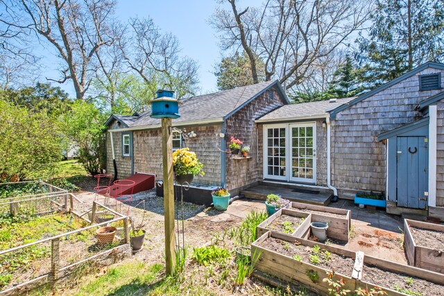 back of house with french doors