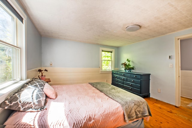 bedroom featuring wood-type flooring