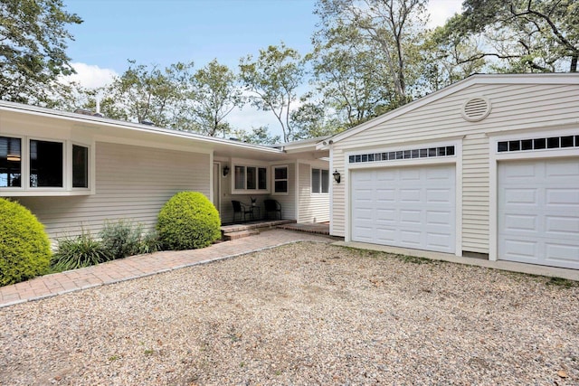 ranch-style home with a garage