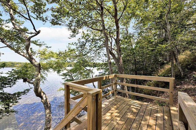 deck featuring a water view