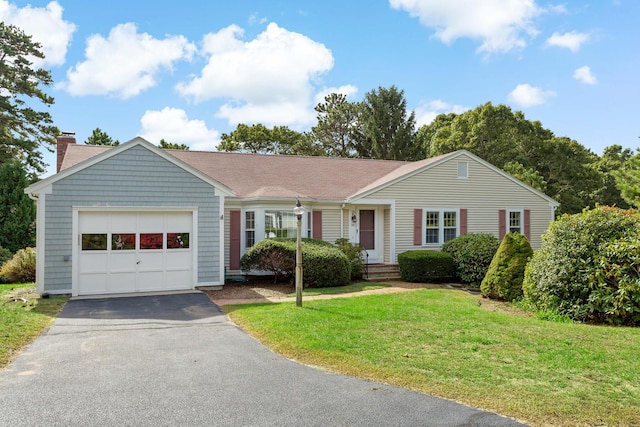 24 Greenland Cir, Yarmouth Port, MA 02675 - ranch-style home with a chimney, a garage, a front lawn, and asphalt driveway