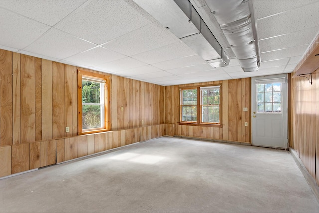 24 Greenland Cir, Yarmouth Port, MA 02675 - empty room featuring concrete floors and wooden walls