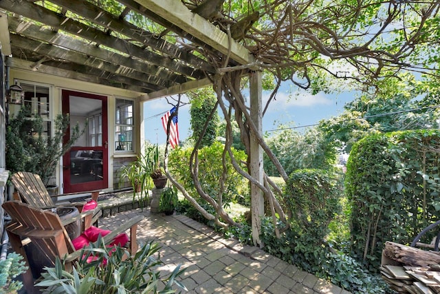 view of patio featuring a pergola