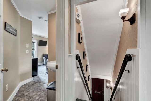 interior space featuring crown molding