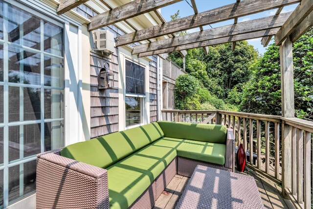 wooden terrace with a pergola