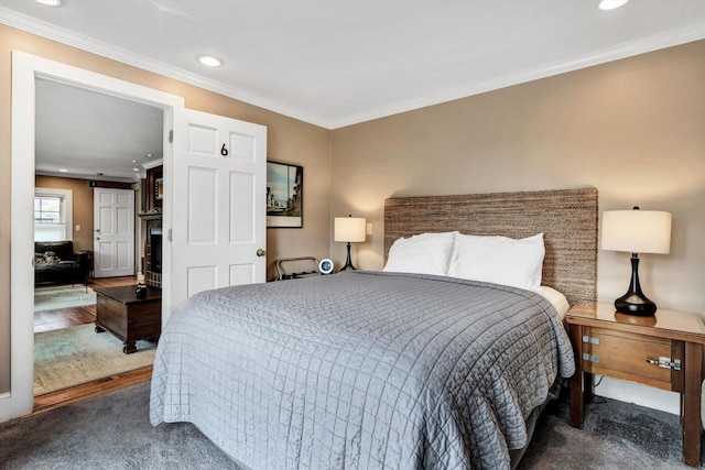 bedroom featuring carpet floors and ornamental molding