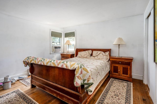 24 Hazelmoor Rd, South Yarmouth, MA 02664 - bedroom featuring hardwood / wood-style floors, cooling unit, and baseboards