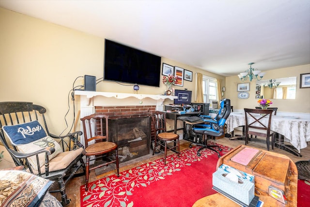 24 Hazelmoor Rd, South Yarmouth, MA 02664 - living room with a chandelier, wood finished floors, and a fireplace