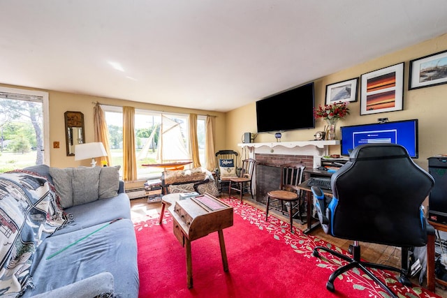 24 Hazelmoor Rd, South Yarmouth, MA 02664 - living area with a fireplace and wood finished floors