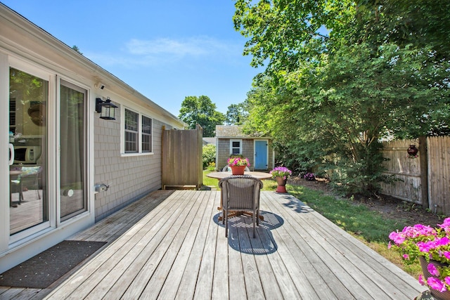 31 Chase St, Dennis Port, MA 02639 - wooden deck with a storage unit