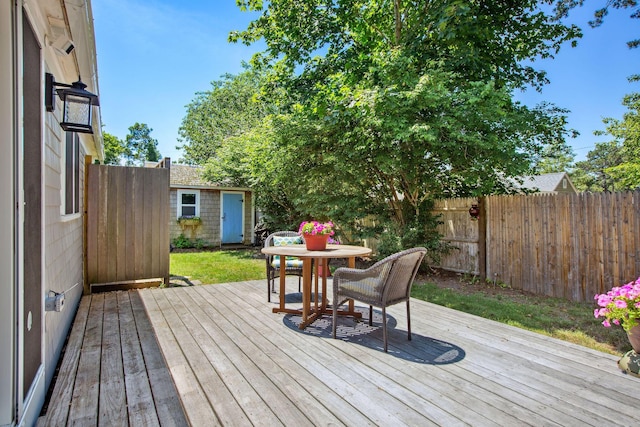 31 Chase St, Dennis Port, MA 02639 - deck featuring a shed, outdoor dining area, and a fenced backyard