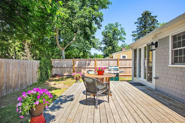 31 Chase St, Dennis Port, MA 02639 - wooden terrace with a grill and a fenced backyard