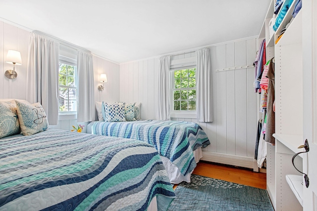31 Chase St, Dennis Port, MA 02639 - bedroom with wood finished floors and baseboard heating