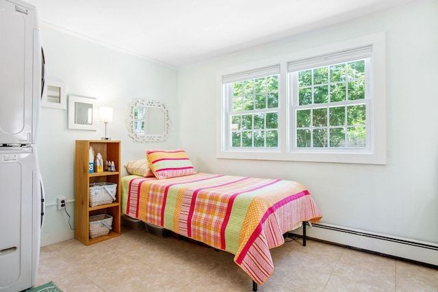31 Chase St, Dennis Port, MA 02639 - bedroom with baseboard heating, ornamental molding, fridge, and light tile patterned floors