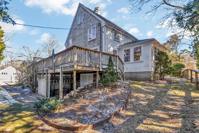 rear view of house with a deck