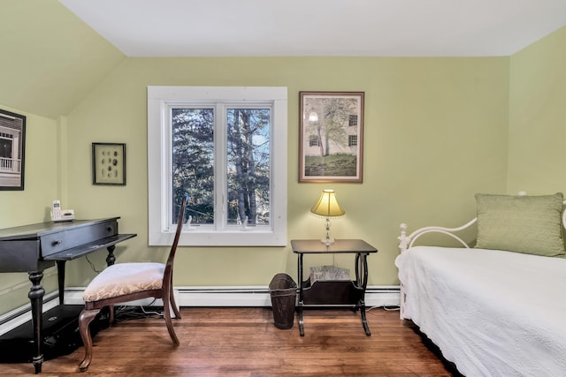bedroom featuring dark hardwood / wood-style flooring, vaulted ceiling, and baseboard heating