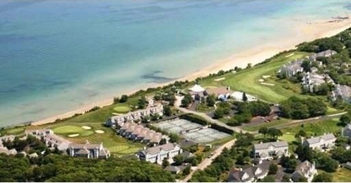 bird's eye view with a view of the beach and a water view