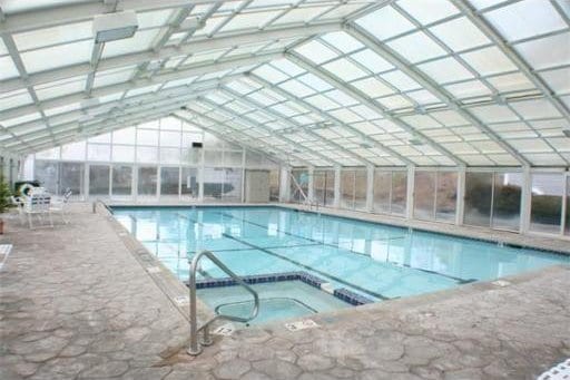 pool featuring an indoor in ground hot tub