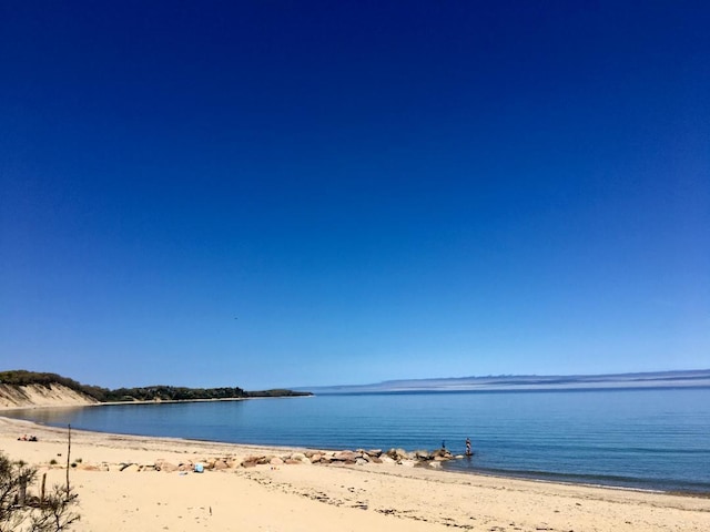 view of water feature with a beach view