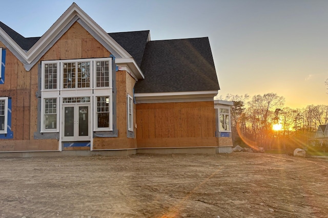 5 Rockhill Rd, Sandwich, MA 02563 - back of house featuring a shingled roof, french doors, and a garage