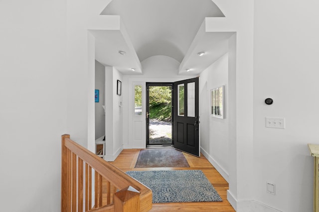 82 Harbor Hill Rd, Woods Hole, MA 02543 - foyer entrance with baseboards, light wood-style floors, and vaulted ceiling