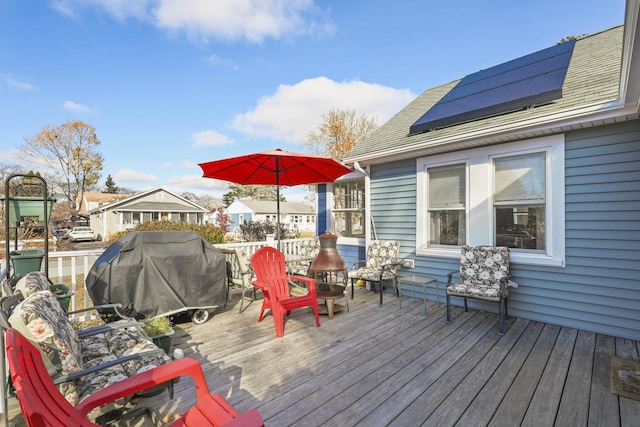 wooden terrace with grilling area