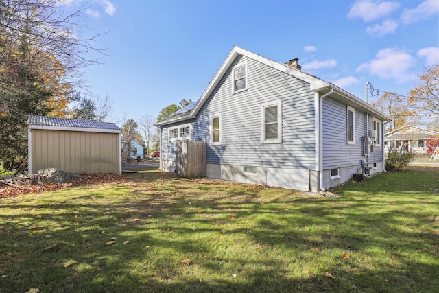 view of property exterior with a lawn