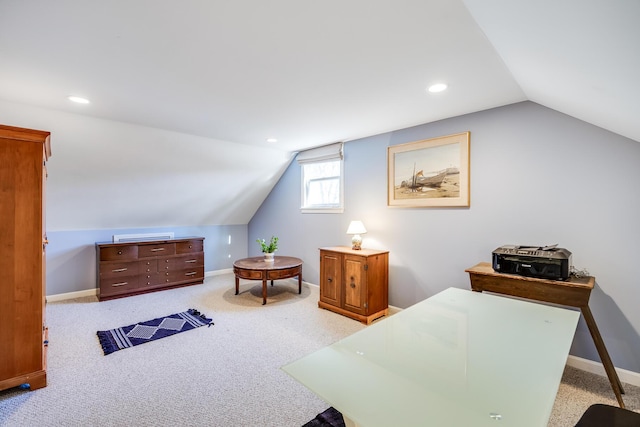 carpeted office space featuring lofted ceiling, recessed lighting, and baseboards