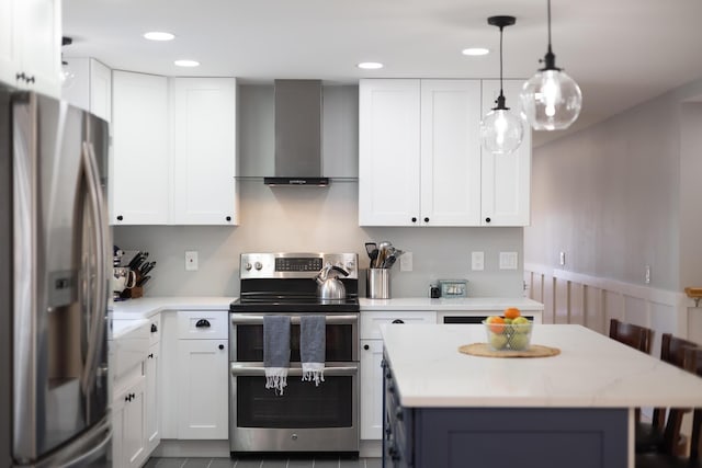 kitchen featuring a center island, white cabinets, wall chimney exhaust hood, and stainless steel appliances