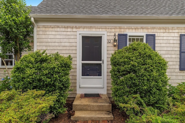 32 Purmackene Ln, Harwich Port, MA 02646 - property entrance featuring roof with shingles