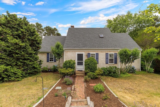 32 Purmackene Ln, Harwich Port, MA 02646 - cape cod-style house featuring a front yard, a chimney, roof with shingles, and entry steps