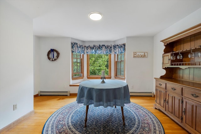 32 Purmackene Ln, Harwich Port, MA 02646 - dining area with a baseboard heating unit and light wood-type flooring