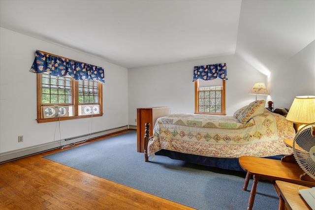 32 Purmackene Ln, Harwich Port, MA 02646 - bedroom featuring wood finished floors, a baseboard heating unit, and lofted ceiling