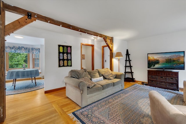 32 Purmackene Ln, Harwich Port, MA 02646 - living area with wood finished floors and beam ceiling