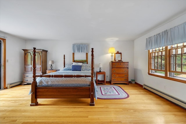 32 Purmackene Ln, Harwich Port, MA 02646 - bedroom featuring baseboard heating and wood finished floors