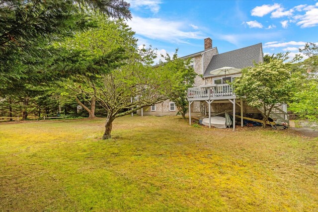 32 Purmackene Ln, Harwich Port, MA 02646 - view of green lawn featuring a deck and stairway