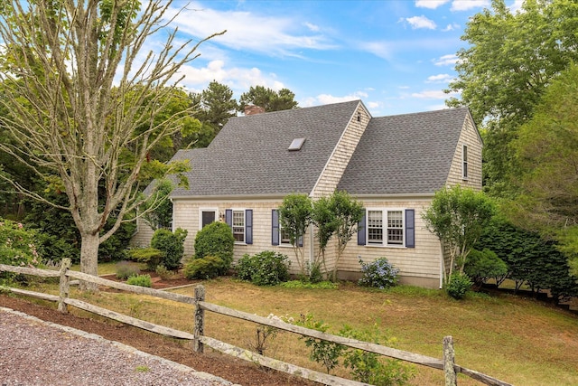 32 Purmackene Ln, Harwich Port, MA 02646 - cape cod-style house with a shingled roof and a chimney