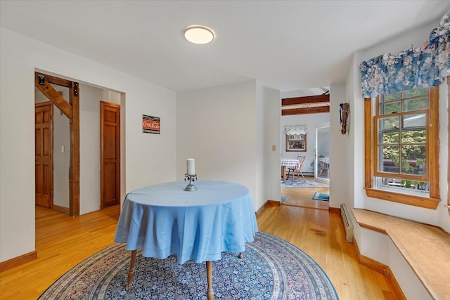 32 Purmackene Ln, Harwich Port, MA 02646 - dining space with light wood finished floors, healthy amount of natural light, and baseboard heating