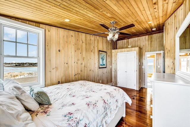 6 Baker Way, West Dennis, MA 02670 - bedroom featuring wooden ceiling, wood walls, and dark wood-style flooring