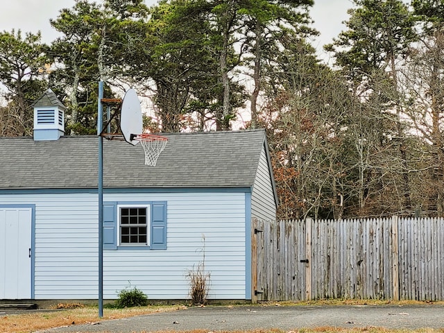 garage with fence