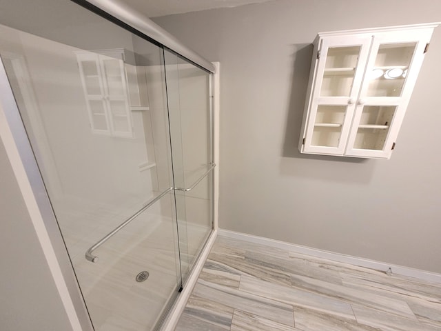 114 Chestnut Cir, Brewster, MA 02631 - bathroom with baseboards and a shower stall