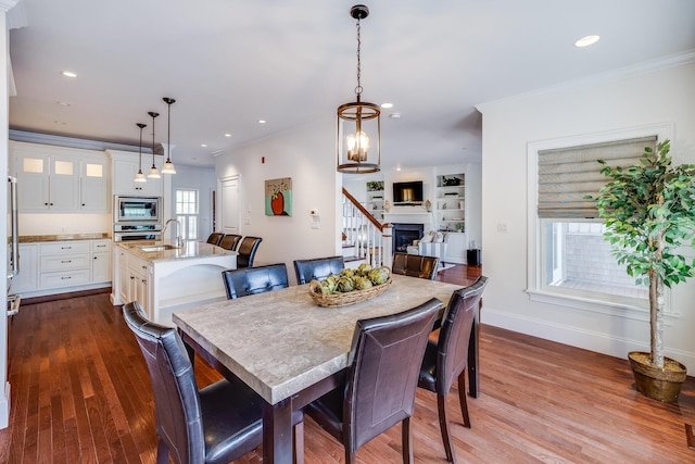780 Craigville Beach Rd Unit B1, Centerville, MA 02632 - dining area with stairs, baseboards, dark wood-type flooring, ornamental molding, and recessed lighting