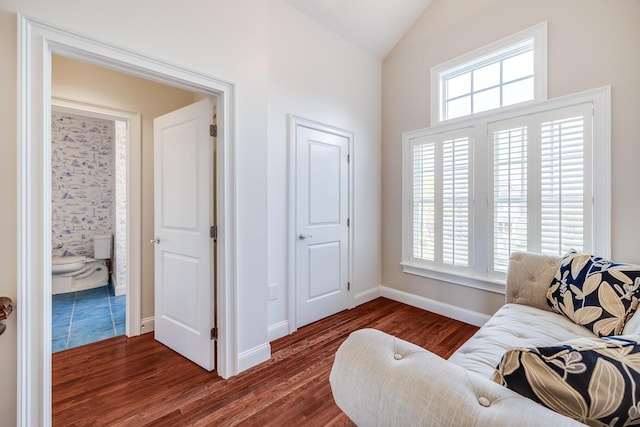 780 Craigville Beach Rd Unit B1, Centerville, MA 02632 - sitting room with vaulted ceiling, dark wood-style flooring, and baseboards