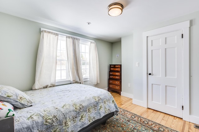 bedroom featuring light hardwood / wood-style floors