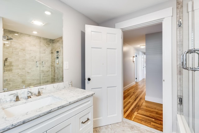 bathroom with vanity and walk in shower