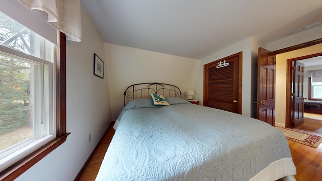 14 Daisy Ln, South Yarmouth, MA 02664 - bedroom featuring wood finished floors and a closet