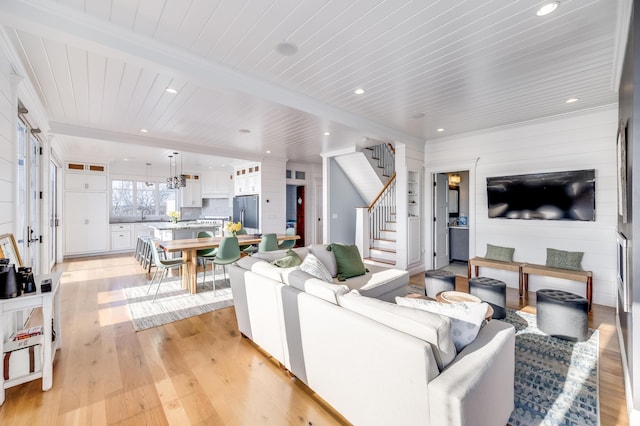 15 W Rd, Eastham, MA 02642 - living area with a wood ceiling with exposed beams, light wood-style flooring, recessed lighting, and stairway