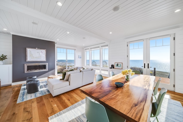 15 W Rd, Eastham, MA 02642 - dining area featuring wooden ceiling, french doors, wood finished floors, recessed lighting, and a glass covered fireplace