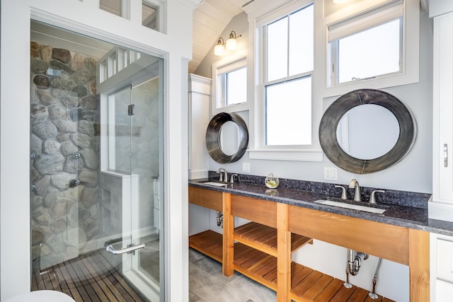 15 W Rd, Eastham, MA 02642 - bathroom featuring a stall shower, lofted ceiling, double vanity, and tile patterned flooring